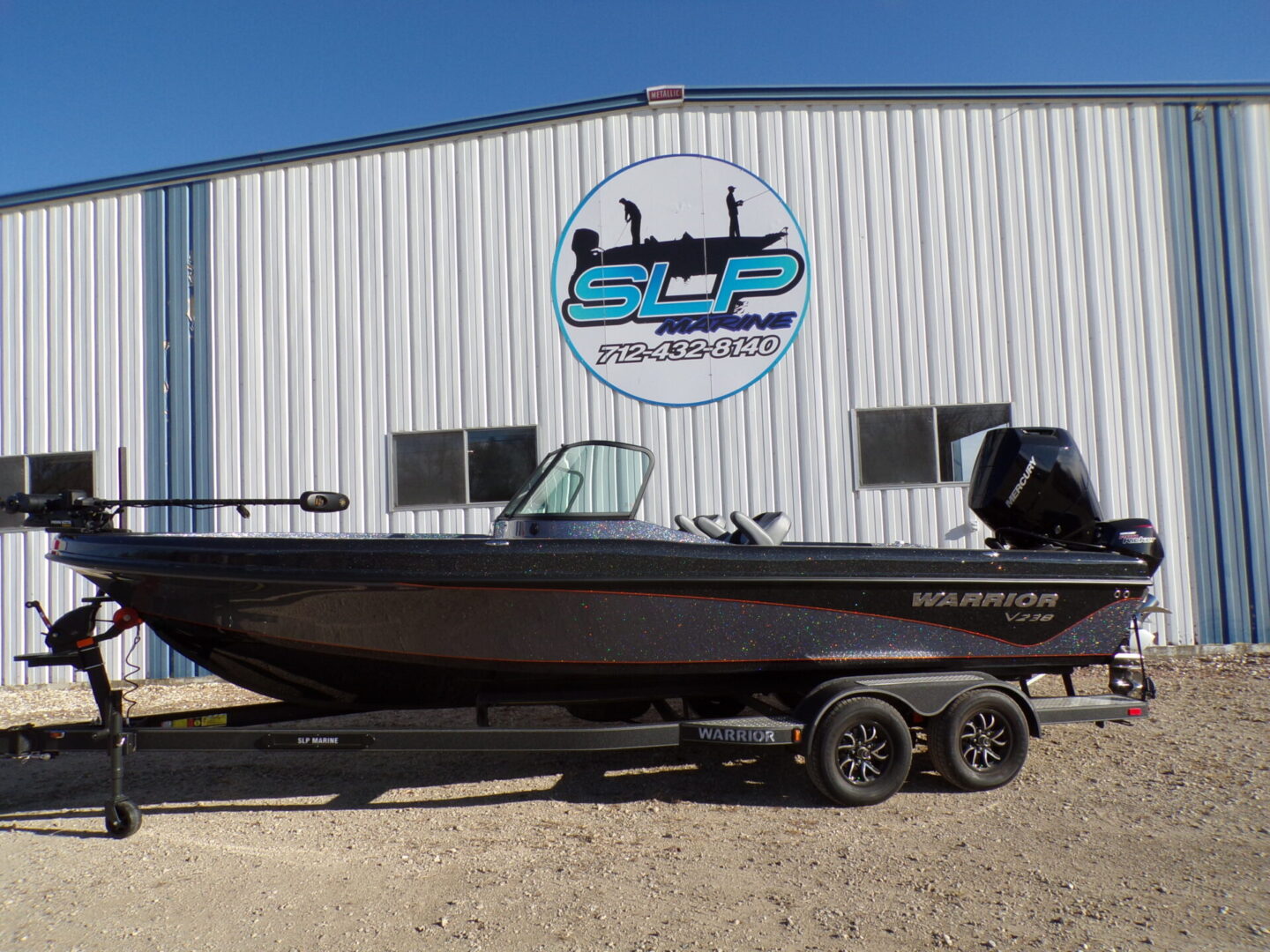 A boat parked in front of a building.