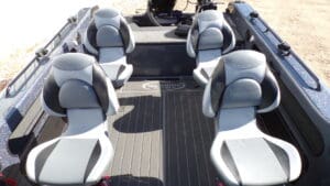 A boat with seats on the back of it.