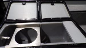 Stainless steel compartment with circular cutout