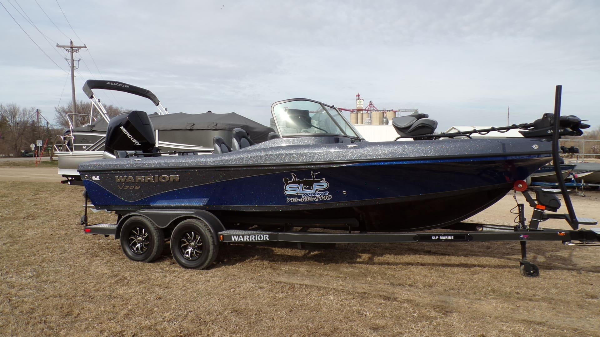 Blue Warrior fishing boat on trailer