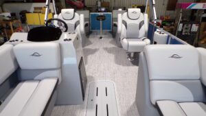 Spacious pontoon boat interior with cushioned seats
