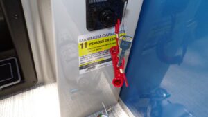Boat ignition with red safety lanyard