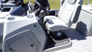 Suncatcher pontoon boat helm with captain seat