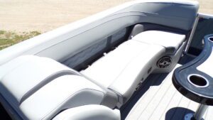White cushioned pontoon boat rear bench seat