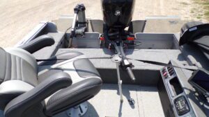 Fishing boat deck with outboard motor and seats