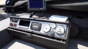Boat dashboard with gauges and fishfinder