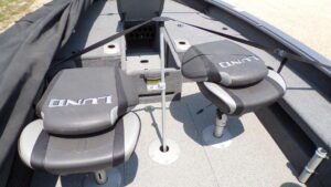 Two gray Lund fishing boat seats