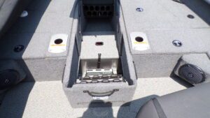 Fishing boat deck with open storage compartment
