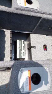 Boat compartment showing battery and seat bases
