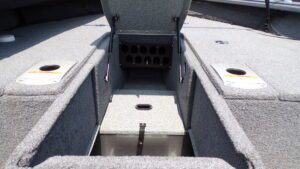 Open carpeted bass boat storage compartments