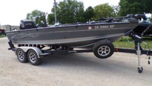 Gray Lund fishing boat on dual-axle trailer
