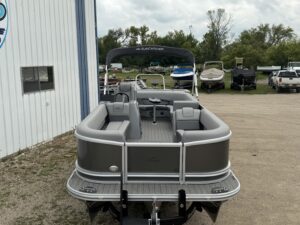 Rear view of a gray pontoon boat.